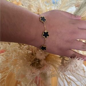 Brand new gold plated bracelet in black, geeen white and mother bracelet